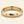 A gold band mens wedding ring with a hammered texture on the exterior and a polished interior by ring bear with comfort fit, set against a solid cream background.